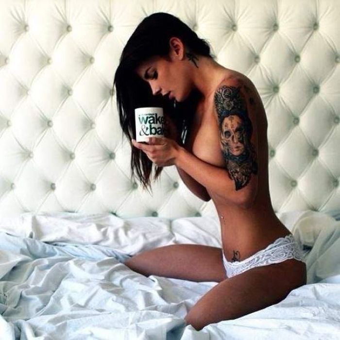 Fine naked girl with tattoo