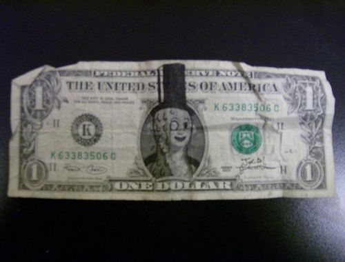 25 Defaced Dollar Bills (25 pics)