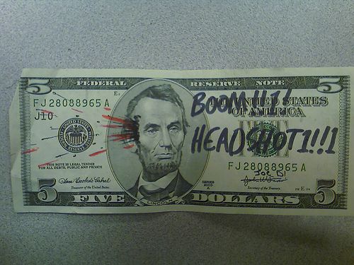 25 Defaced Dollar Bills (25 pics)
