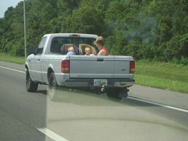 Children Riding In Cargo Area Of A Pickup Truck (6 pics)