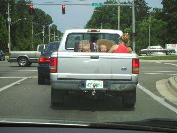 Children Riding In Cargo Area Of A Pickup Truck (6 pics)