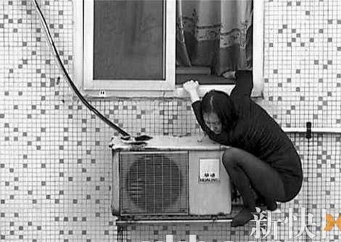 Suicide Girl Sitting on an Air Conditioner (8 pics)