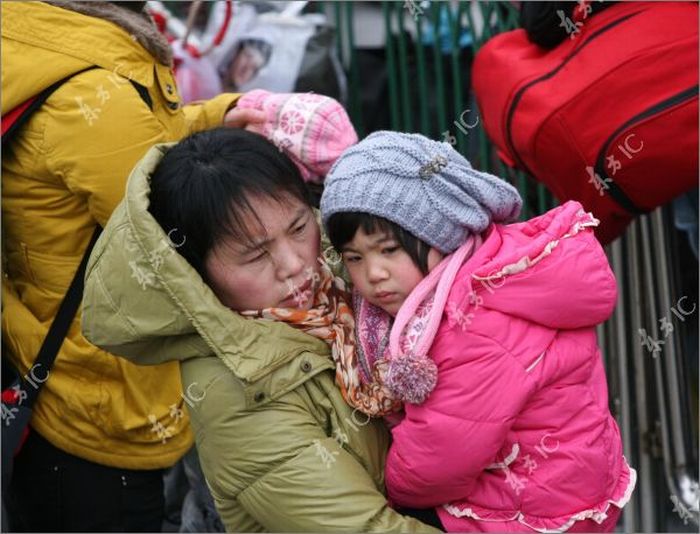 China blizzard disrupts pre-holiday rush for home (24 pics)