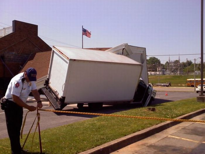 Truck Driver Destroys a Bank (9 pics)