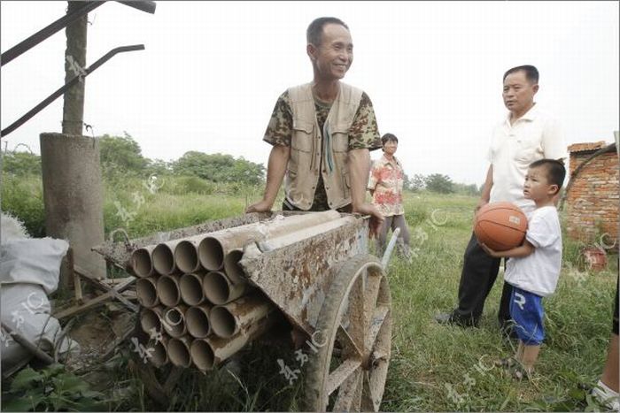 Chinese Farmer Defends His Land Homemade Canon (16 pics)