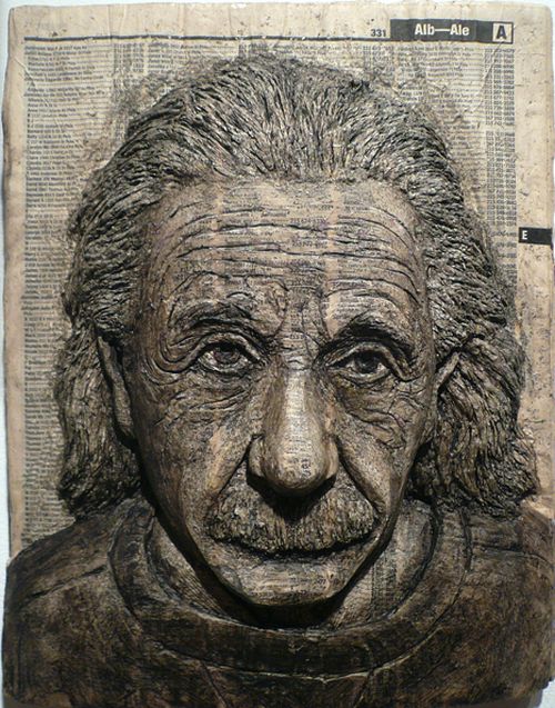 Phone Book Carvings of Celebrity Faces (10 pics)