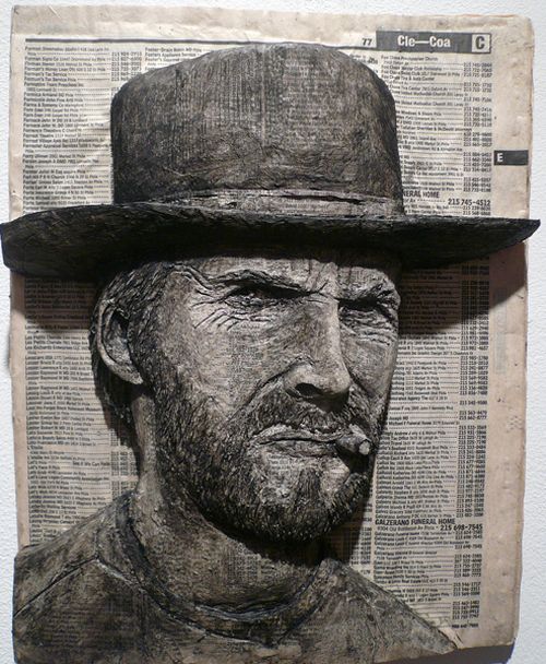 Phone Book Carvings of Celebrity Faces (10 pics)