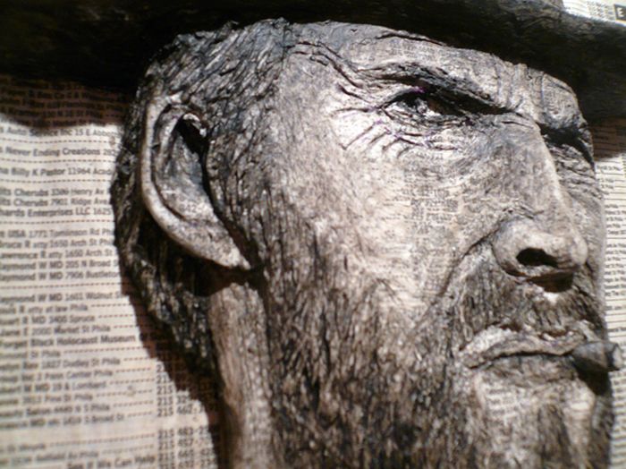 Phone Book Carvings of Celebrity Faces (10 pics)