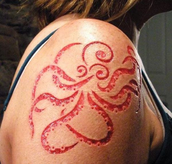 Insane Scarification Tattoos (25 pics)