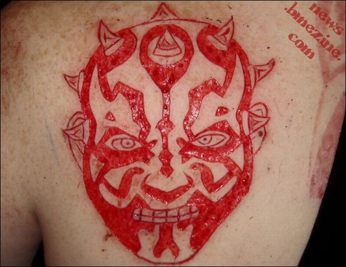 Insane Scarification Tattoos (25 pics)