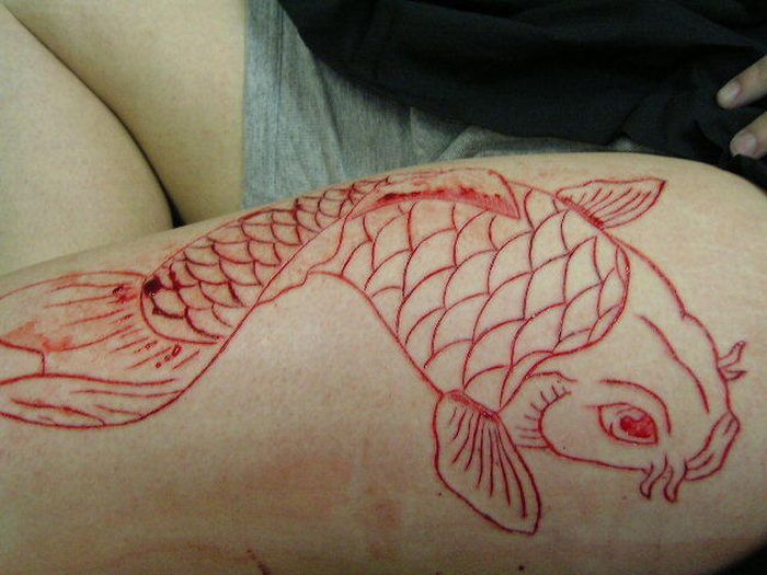 Insane Scarification Tattoos (25 pics)