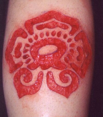 Insane Scarification Tattoos (25 pics)