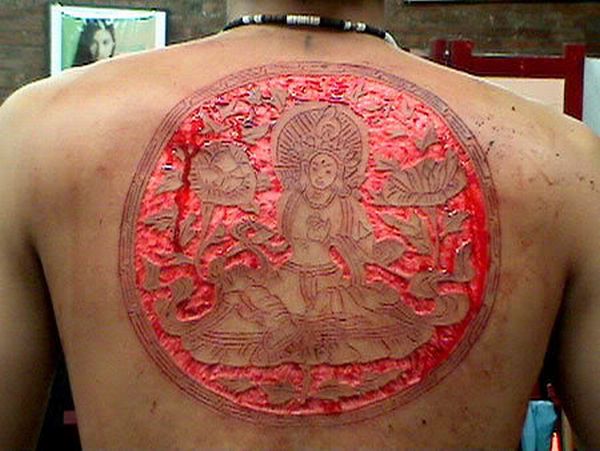 Insane Scarification Tattoos (25 pics)