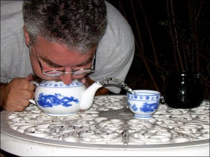 Blowing Water Out of a Teapot (18 pics)