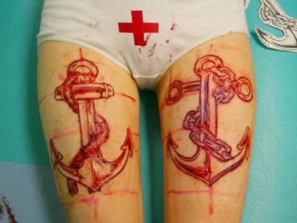 Extreme Scarification Tattoos (17 pics)