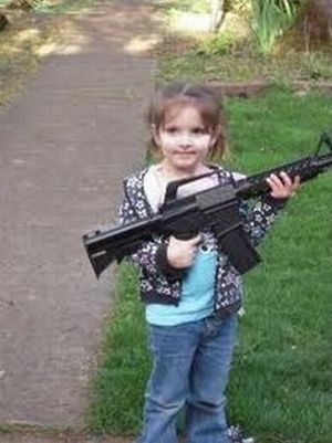 Little Girls with Guns (18 pics)
