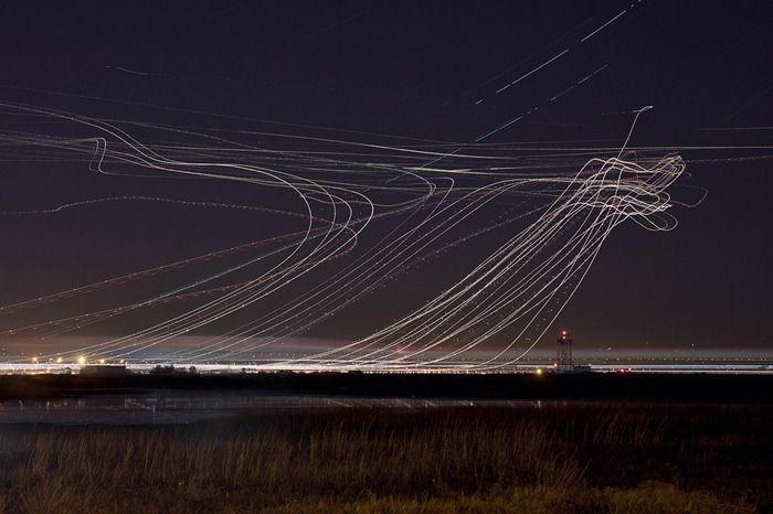 Long Exposure Shots of Airline Takeoffs and Landings (14 pics)