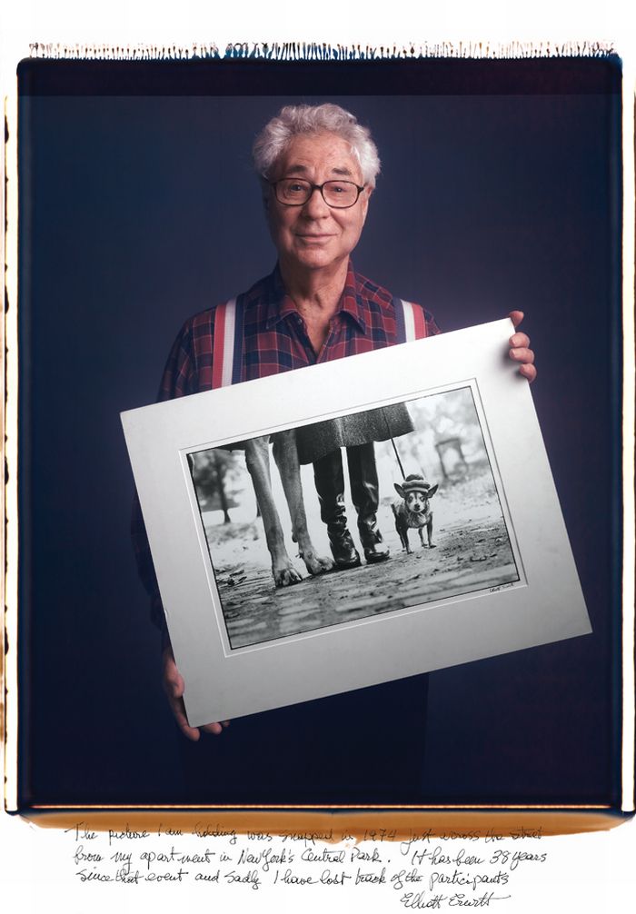 Famous Photographers Pose With Their Most Iconic Images (13 pics)