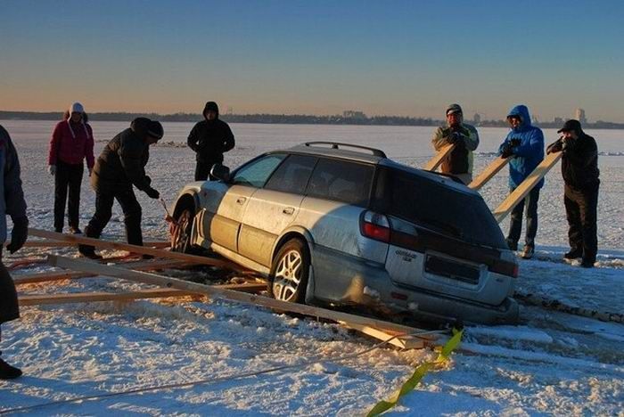 Frozen Lake Driving Gone Bad (4 pics)