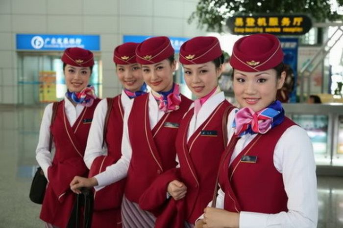 Stewardesses From All Over the World (34 pics)