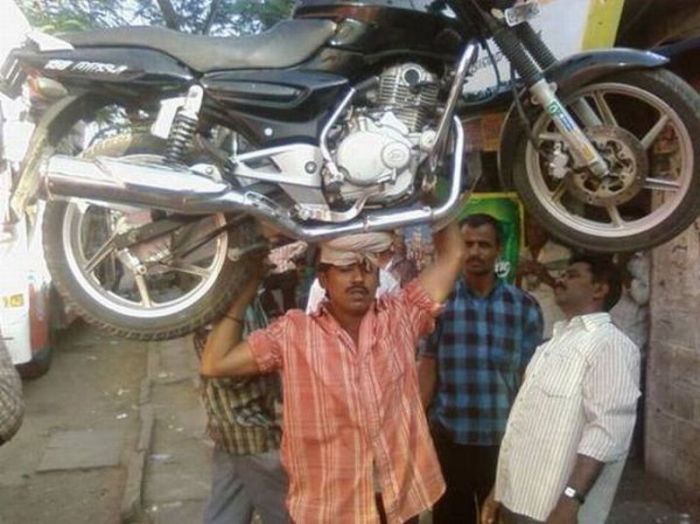 Indian Man with  Motorbike on His Head (4 pics)
