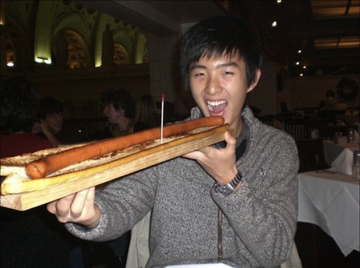 People Consuming Large Things (15 pics)