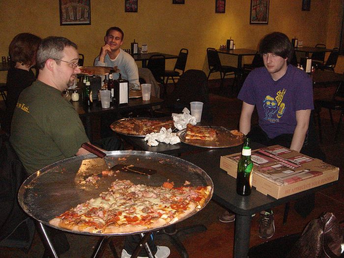People Consuming Large Things (15 pics)