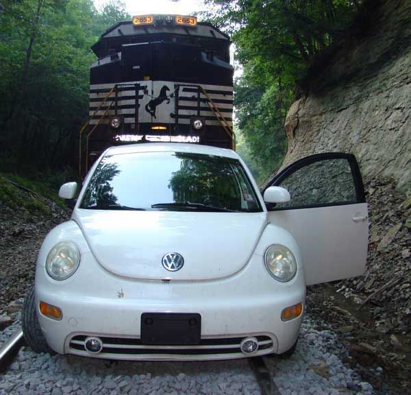 Woman Arrested After Driving Car Down Railway Tracks (3 pics)