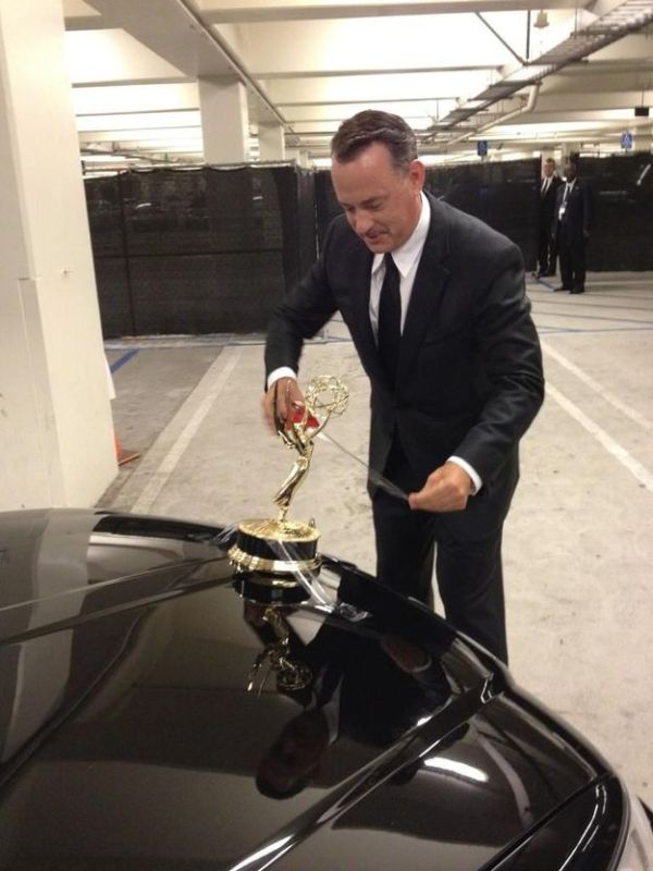 Tom Hanks Uses Emmy as Hood Ornament (3 pics)