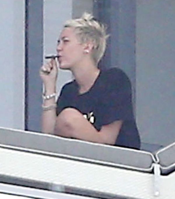 Miley Cyrus Smoking A Joint (11 pics)