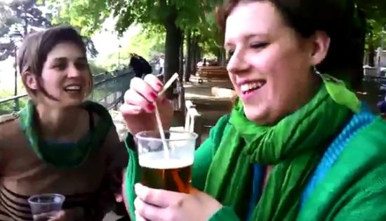 Girl Drinking Beer With Her Ear