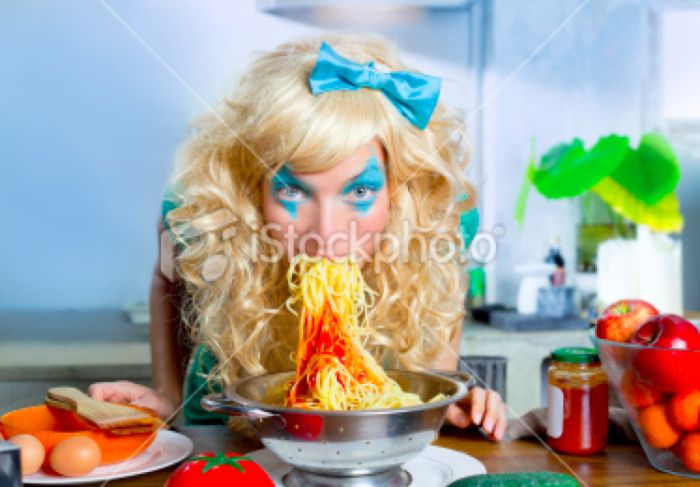 Women Eating Pasta Stock Photos (25 pics)