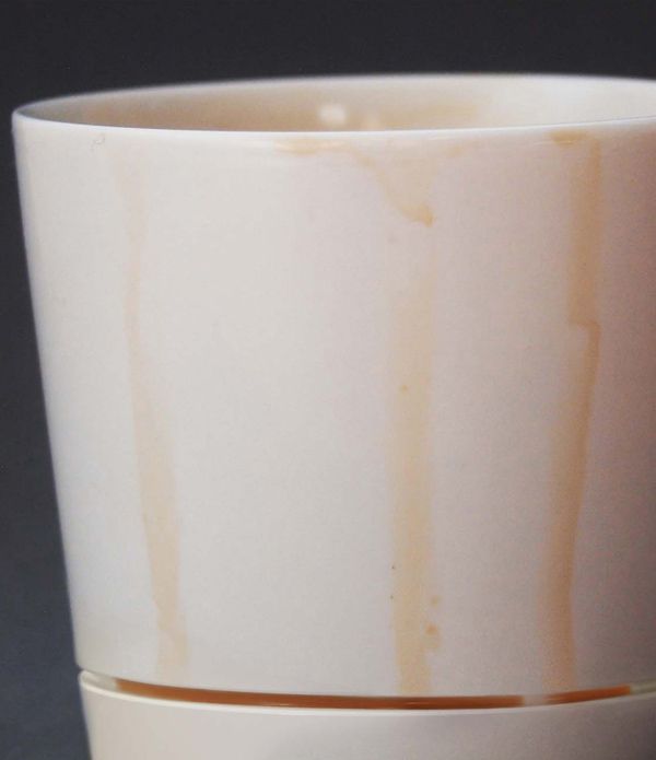 Coffee Mug That Keeps Your Table Clean (4 pics)