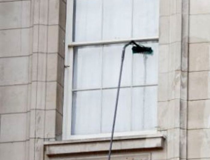 How to Wash a Window (3 pics)