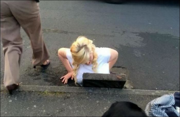 Girl Got Stuck in a Drain While She Tried to Retrieve Her iPhone (5 pics)