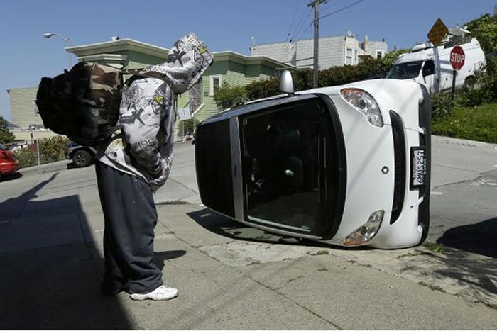 Bad Guys Flipping Over Smart Cars In San Francisco (8 pics)