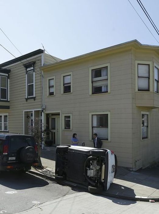 Bad Guys Flipping Over Smart Cars In San Francisco (8 pics)