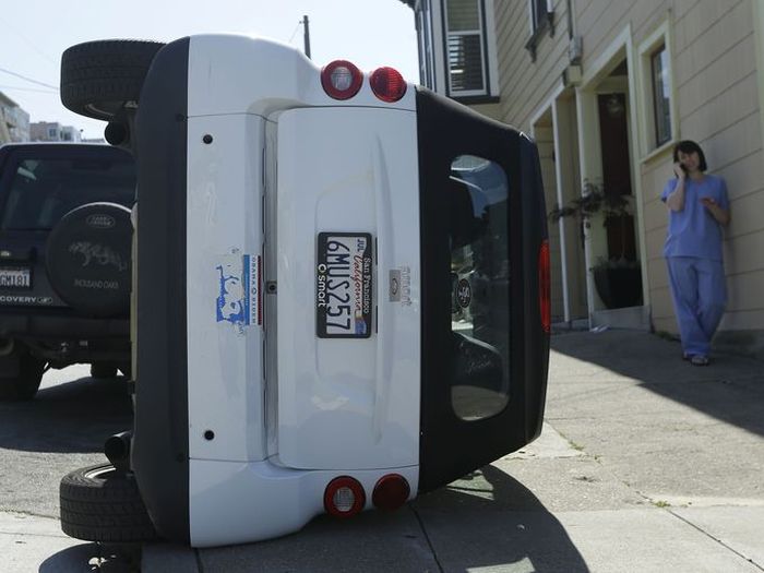 Bad Guys Flipping Over Smart Cars In San Francisco (8 pics)