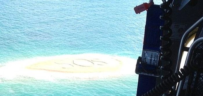 These People Built A Giant SOS And It Saved Their Lives (4 pics)