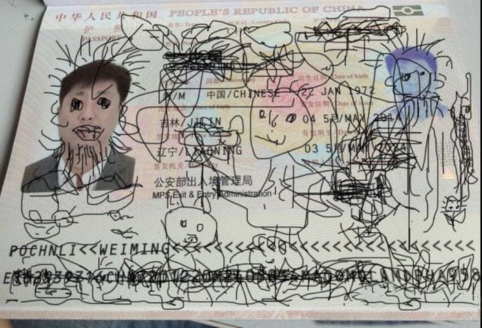 4 Year Old Paints Dad's Passport (3 pics)