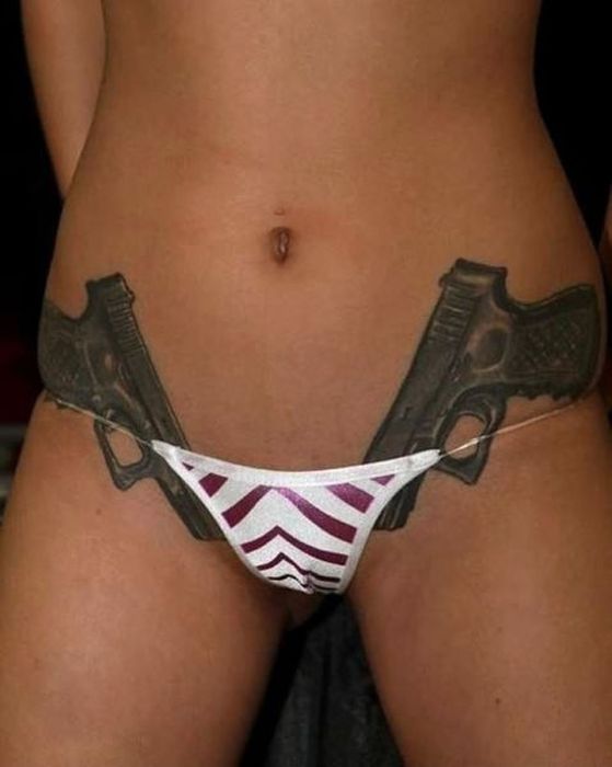 Girls With Guns Have Never Looked Better (30 pics)