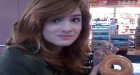 Girl Eating A Donut Like A Lady