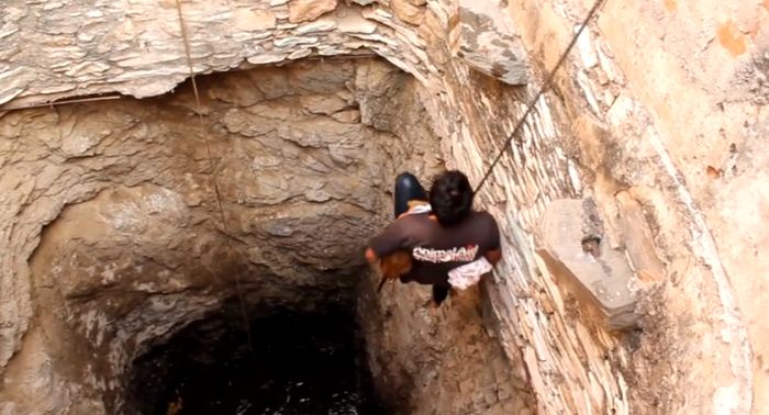 This Brave Man Saved Someone Special From The Well (7 pics)