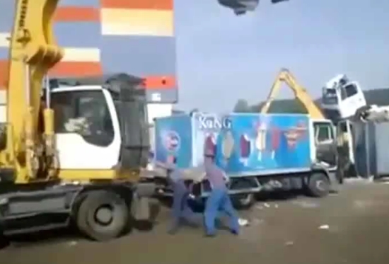 Crane Operator Destroys A Truck During Fight