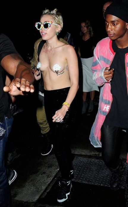 Miley Cyrus Goes Topless Out On The Town (9 pics)
