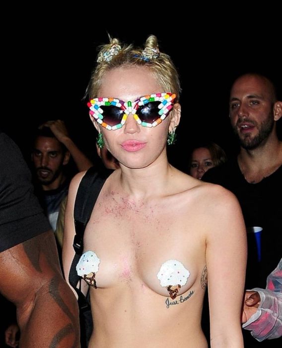 Miley Cyrus Goes Topless Out On The Town (9 pics)