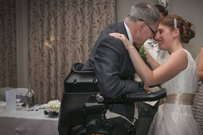 Paralyzed Man Stands At His Daughter's Wedding (2 pics)