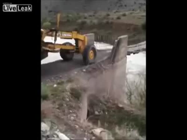 Tractor Crosses A River