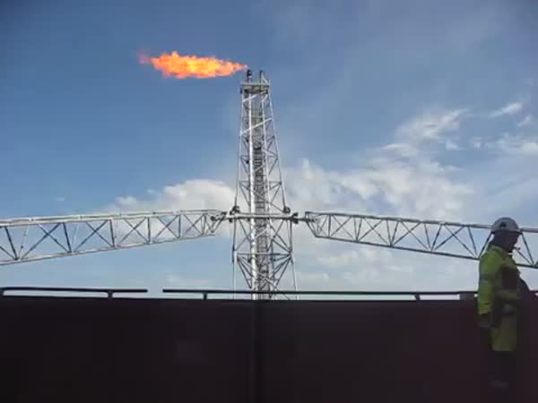 Igniting A Torch On An Oil Platform