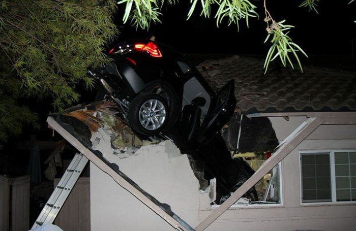Car Goes Through The Roof And Into The Garage (10 pics)